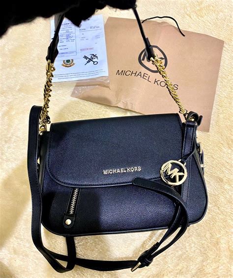 harga tas michael kors sling bag